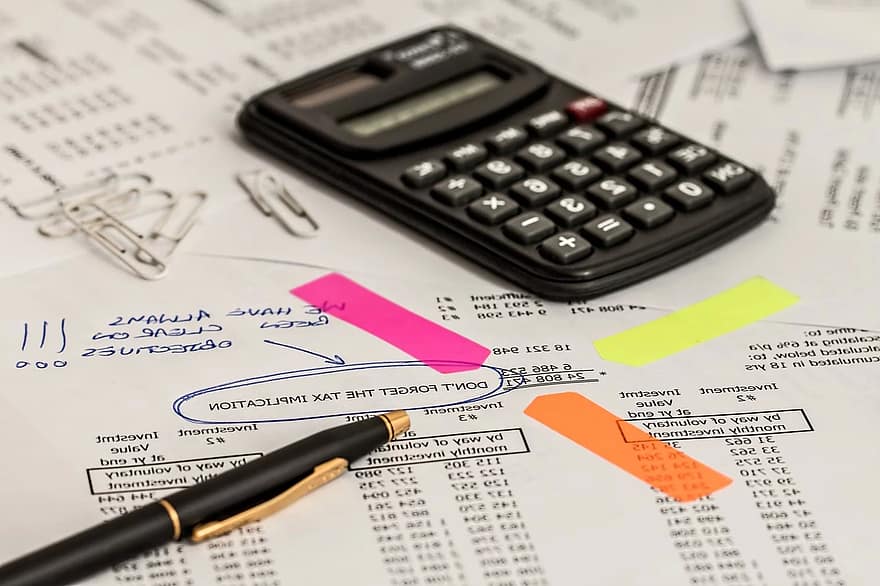Gold-colored Coins Near Calculator · Free Stock Photo Gold-colored Coins Near Calculator · Free Stock Photo